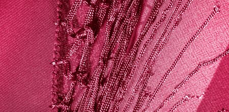 Background texture of silk fabric. This is a natural red scarf, this beautiful nylon satin made of...