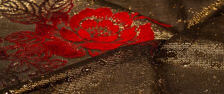 texture, background, pattern, lace with gold sequins Elastic lace pattern from gold strings with...
