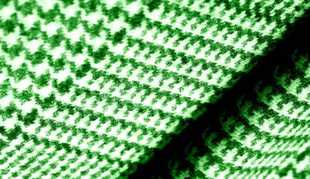 Background texture pattern. The fabric is thick, warm with a checkered pattern green This soft double damping with a light weight is ideal for design and more! Features yarn dyed checkered dark greenの写真素材