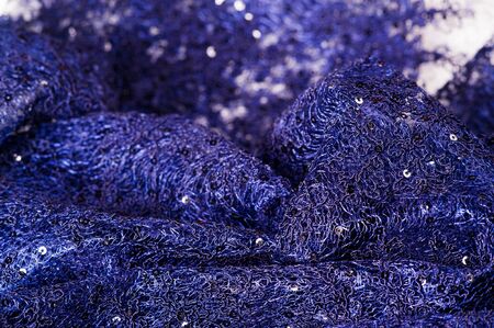 Texture, pattern, lace blue on a white background. Delicate and classic, this sheer lace has no significant stretch and pearlescent shine. This lace fabric is suitable for your design,の写真素材