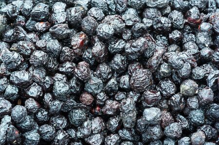 Texture background, pattern. Dried fruits. the sweet and fleshy product of a tree or other plant that contains seed and can be eaten as food.  desiccated, exsiccated, roughageの写真素材