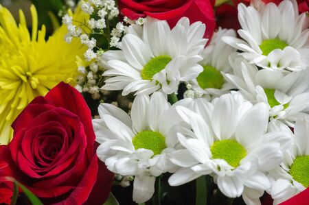 A flower bouquet is a collection of flowers in a creative arrangement. Flower bouquets can be arranged for the decor of homes or public buildings, or may be handheld.の写真素材