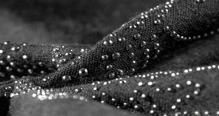 texture, background, pattern, postcard, black silk with glued glass stones to break the light, this fabric is the best fit for your projects, solemnly and stylishlyの写真素材