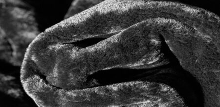 The background texture, pattern, sheepskin are used to make leather goods made of sheepskin and soft woolen clothes or coverings on the lining, including gloves, hats, slippers, footboards for feet,の写真素材