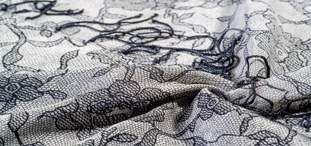 texture, background, pattern. Silk white fabric with lace patterns. This elastic lace trim can add a...