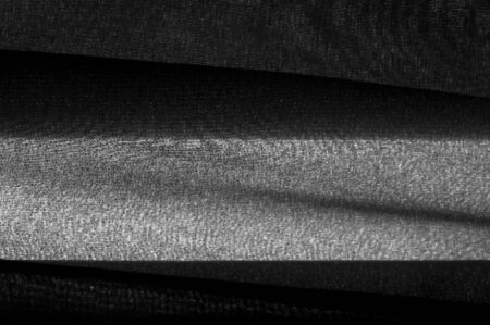 Textured background Plans, Black. This light fabric of linen fabric has a luxurious arm with full-length drapery. Ideal for your design, relic designs, It has cross threads of black and whiteの写真素材