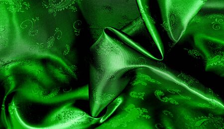 Texture, background, pattern Green silk chiffon fabric with a paisley print. This is a nice addition to any veneer. This is a beautiful floral design for your creativity.の写真素材