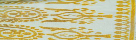 Texture, pattern, collection, silk fabric, female scarf, golden pastel on a beige background,...