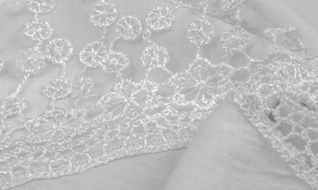 Texture, background, pattern, postcard, silk fabric, female white scarf with lace wrappers. Use...