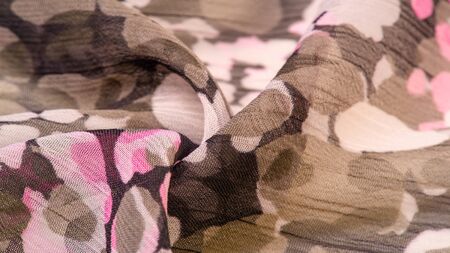 Textured design, silk fabric, women's scarf, white pink red-brown abstract circles, your project will be successful, if you lift this fabric, it will leave indelible impressionsの写真素材