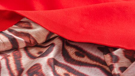 Patterned fabric with red texture This versatile fabric has many uses it can be used for your project design craft projects banners message boards and sweepstakes The possibilities are really endlessの写真素材