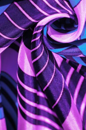 Texture, background, silk fabric with a blue striped pattern. The design of this fabric is devoted to a patchwork mosaic in the style of a white rabbit, representing what a fairytale's vest might look like.の写真素材