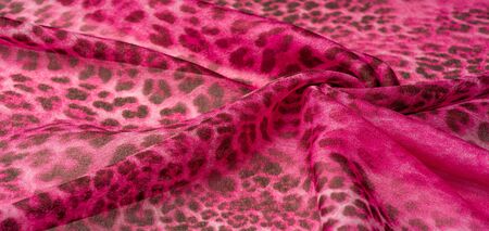 Background texture. leopard silk bright fabric african themesの写真素材