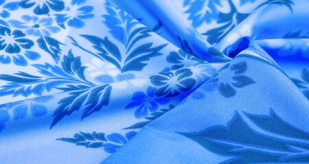 texture, background, pattern, delicate blue silk with floral print Exceptionally lightweight pure silk fabric with a delicate texture. Clean, use lining when opacity is desired.の写真素材
