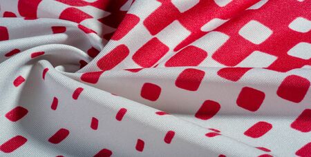 texture background pattern. silk fabric with a pattern of red squares on a white background. This is a heavy square 100% polyester pattern that fits perfectly with modernの写真素材