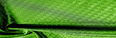 Background texture green silk fabric with a small checkered pattern. When you take home this green...