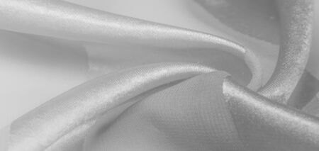 Texture, background, white silk striped fabric with a metallic sheen. If you have a bad mood, this fabric will lift it to unprecedented heights. Your project will be successful.の写真素材