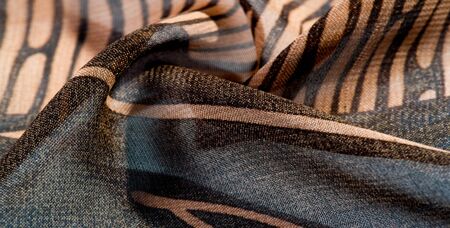 texture, background, pattern, wallpaper. brown silk fabric pattern. This medium-weight rayon fabric has a nice shine with slight color variations. Perfect for adding elegance to your designs.の写真素材