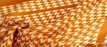 Texture, background, pattern, silk fabric, brown on a white background. pattern on ala fabric of famous french modeler. projects will fulfill your desires you are knownの写真素材