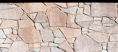 Texture background pattern. Granite stone, sandstone. finishing of buildings fences,  sedimentary...