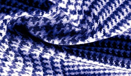 Background texture, pattern. The fabric is thick, warm with a checkered pattern, blue. Stop. You...