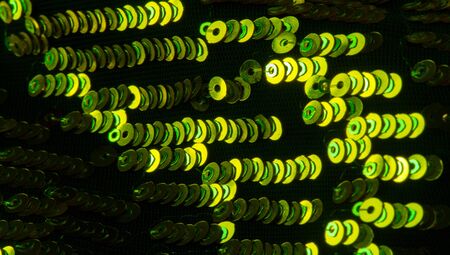 pattern background texture fabric with sequins Die and light this dazzling fabric This heavy fabric has a mesh base with large multi-colored sparkles on the front side It is perfect for your projectsの写真素材