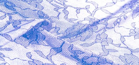 texture, background, pattern. Silk white fabric with lace patterns. This elastic lace trim can add a...