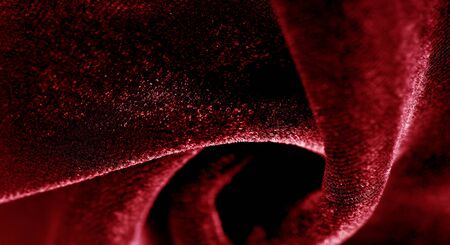 Texture background, pattern. red velveteen. Rock the runway with this beautiful high fashion fabric. This medium weight fabric has a beautiful shine with a velvet face for a feeling of luxury.の写真素材
