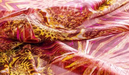 Background texture pattern Red maroon fabric. This is a collection of fine silk fibers This is a special occasion for your designs wallpapers and posters Colors include black yellow pink and burgundyの写真素材