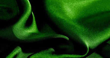 Background, pattern, texture, wallpaper, green silk fabric. Add a touch of luxury to any design by adding it to this ultra-soft and very lightweight polyester lining fabric.の写真素材