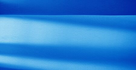 Picture. Texture, background. Blue sapphire silk fabric. This luxurious soft fabric has an...