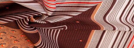 Texture, pattern, collection, silk fabric, brown background with a striped pattern of white and red...