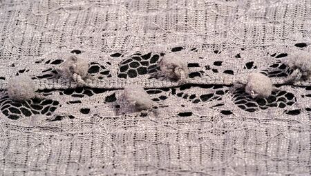Texture background, female lace scarf. Arrived quickly and beautifully, silver color. The scarf is thin but very attractive and very well made with no loose yarn or loose parts.の写真素材