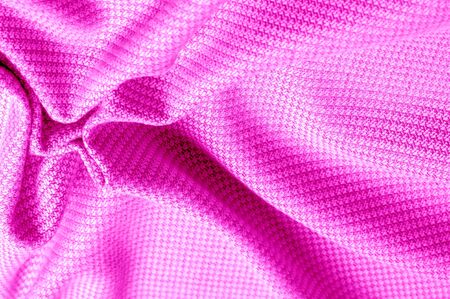 Background texture, pattern Fabric warm wool with a stitched red thread. This one makes us want to curl a fireplace with a mug of hot chocolate. His ultra-soft and fuzzy hand is an open knit designの写真素材