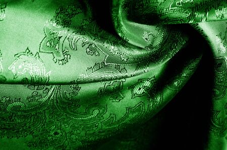 texture, background, green, verdant, lawny, vealy, virid,  blushful fabric with a paisley pattern. based on traditional Asian elementsの写真素材