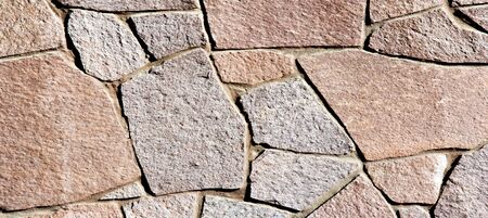 Texture background pattern. Granite stone, sandstone. finishing of buildings fences,  sedimentary...