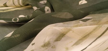 Background texture. Women's olive-colored scarf Photography for your projects from pashmina Stolen shawls, shawls Your projects will be the best, creativity knows no bounds! dare to be the bestの写真素材