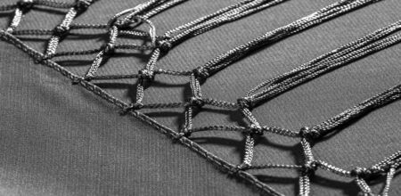 Background texture of silk fabric. This is a natural black scarf, this beautiful nylon satin made of...