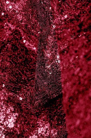 Texture, pattern, lace fabric in red on a white background. Delicate and classic, this sheer lace has no significant stretch and pearlescent shine. Suitable for your design wallpapers and postersの写真素材