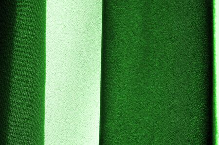 Textured, background, pattern, green fabric. Alpine upholstery Velvet hunter Green patio. This fabric - your decision in design, will give your page on the Internet a not forgetful foreshorteningの写真素材