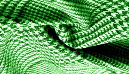 Background texture pattern. The fabric is thick, warm with a checkered pattern green This soft double damping with a light weight is ideal for design and more! Features yarn dyed checkered dark greenの写真素材