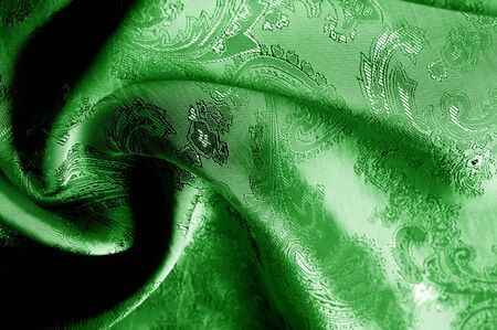 texture, background, green, verdant, lawny, vealy, virid,  blushful fabric with a paisley pattern. based on traditional Asian elementsの写真素材