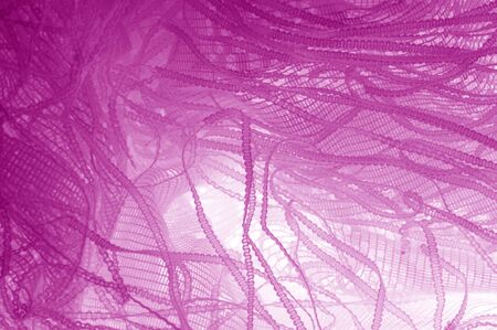 Texture background, red tulle Let your playful side show in this delightfully generous pink tulle. The red carpet is ready to shine Thin and light on the floor This is a funky way to make a spotlightの写真素材