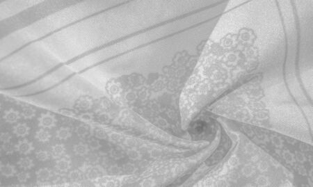Texture pattern, black gray silk fabric on a white background, flowers pattern silhouette on white...