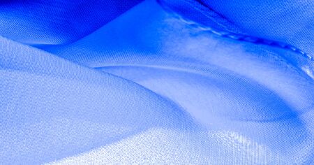 texture, background, pattern, cyan blue, silk fabric This very lightweight artificial silk fabric has a pleasant sheen. Perfect for adding elegance to your internet decor projects.の写真素材