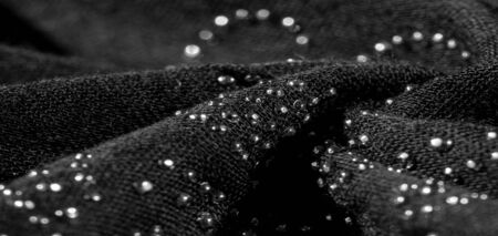 texture, background, pattern, postcard, black silk with glued glass stones to break the light, this fabric is the best fit for your projects, solemnly and stylishlyの写真素材