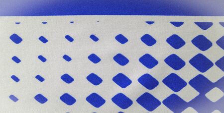 texture background pattern. silk fabric with a pattern of blue squares on a white background. This is a heavy square 100% polyester pattern that fits perfectly with modern, transitional or contemporary design.の写真素材