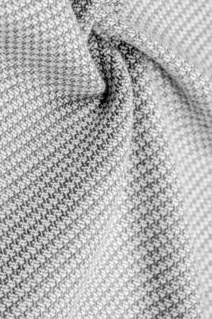 Background texture, pattern Fabric warm wool with stitched gray thread. Shake things with this white...