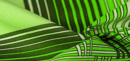 Texture, background, pattern, silk fabric, brown color, geometric lines, pattern from tribal straight lines of different shades, geometric pattern, set for your projects, green and whiteの写真素材