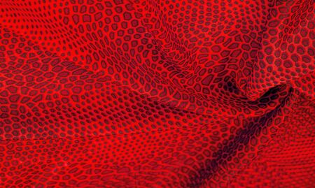 red silk fabric, animal skin. All projects are new and designed in our studio by designers who have deep knowledge in the field of fabric photography and the use of their final product.の写真素材